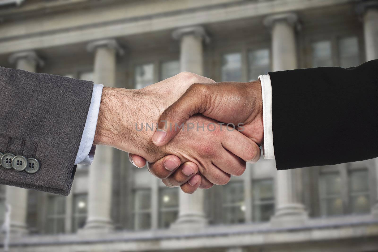 A close-up of two businessmen shaking hand 