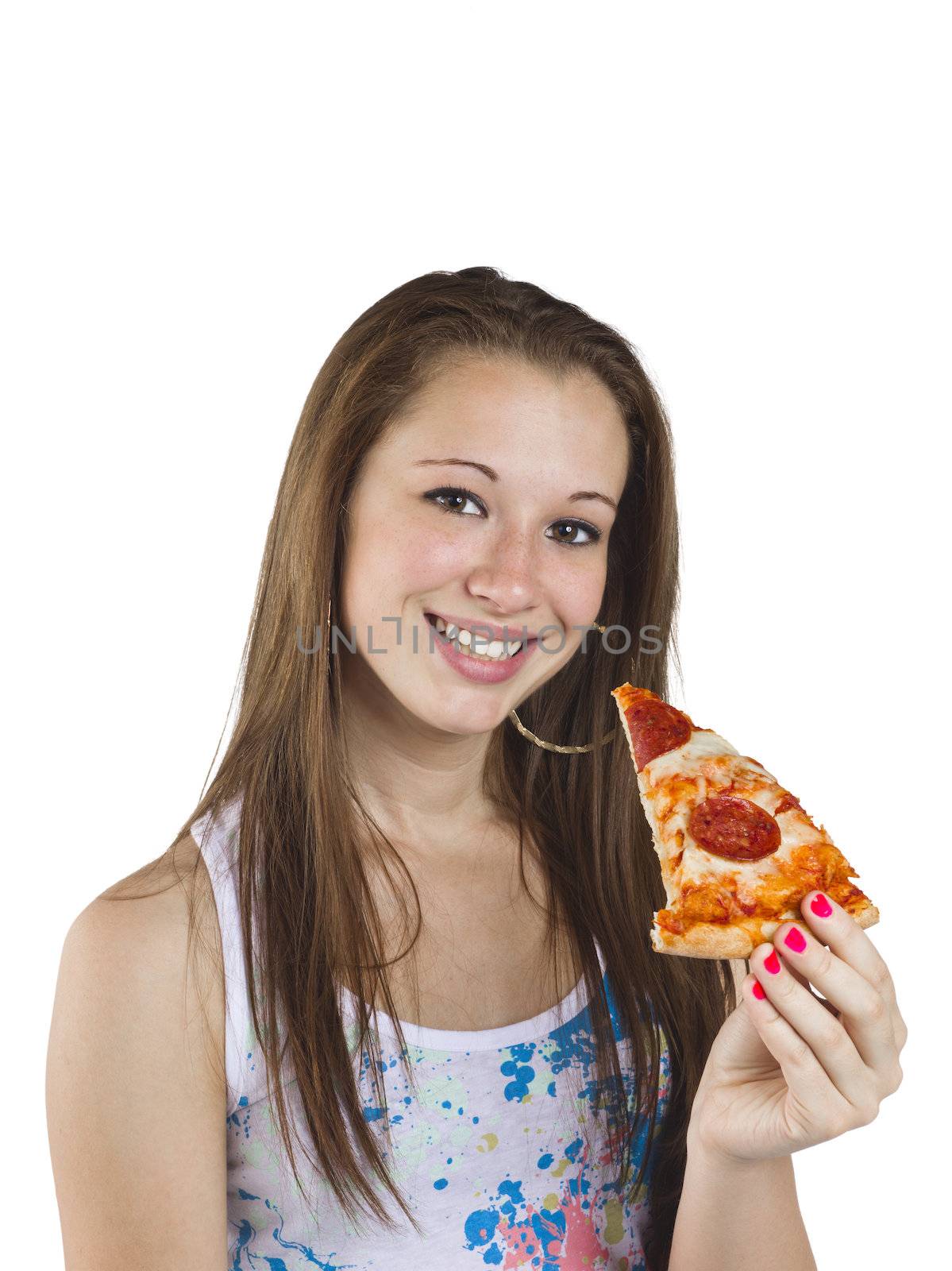 Portrait of a teenage girl holding a slice of pizza against white background.