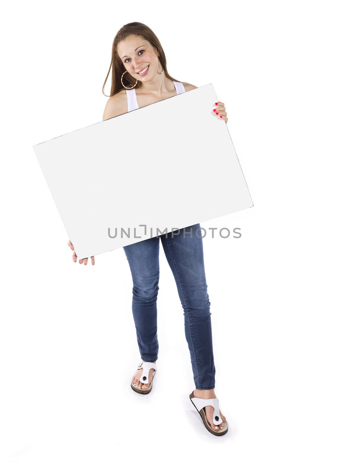 View of a teenage girl holding a blank placard over white background.