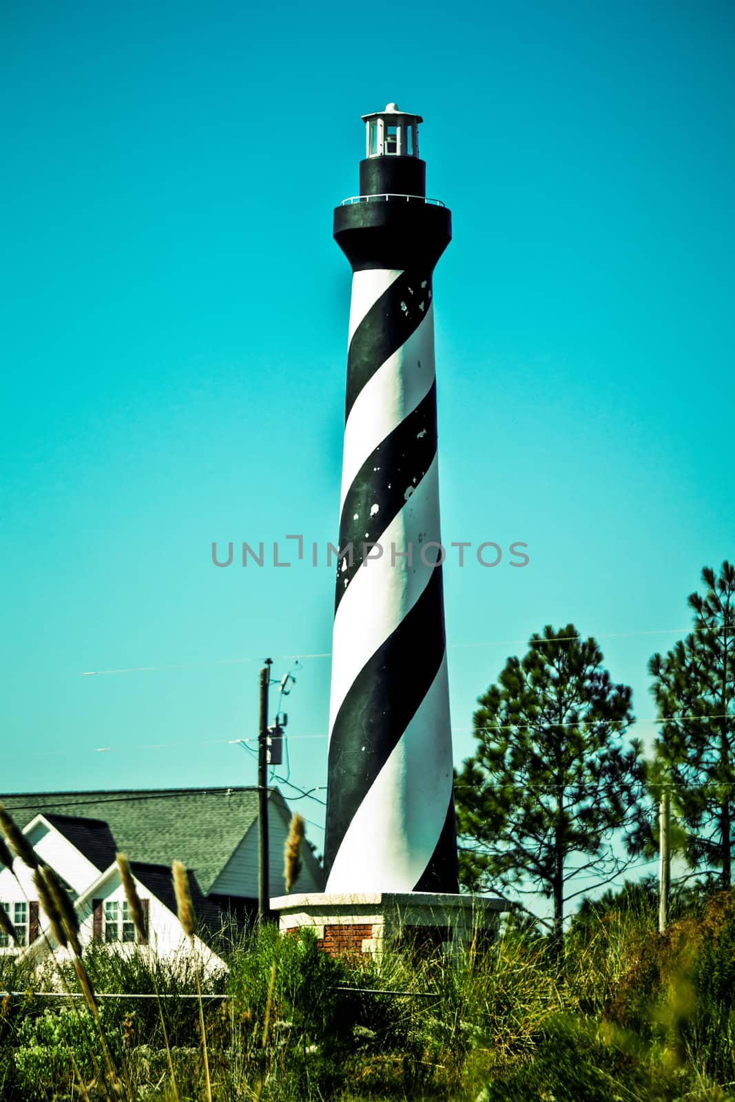 an image of lighthouse in small town