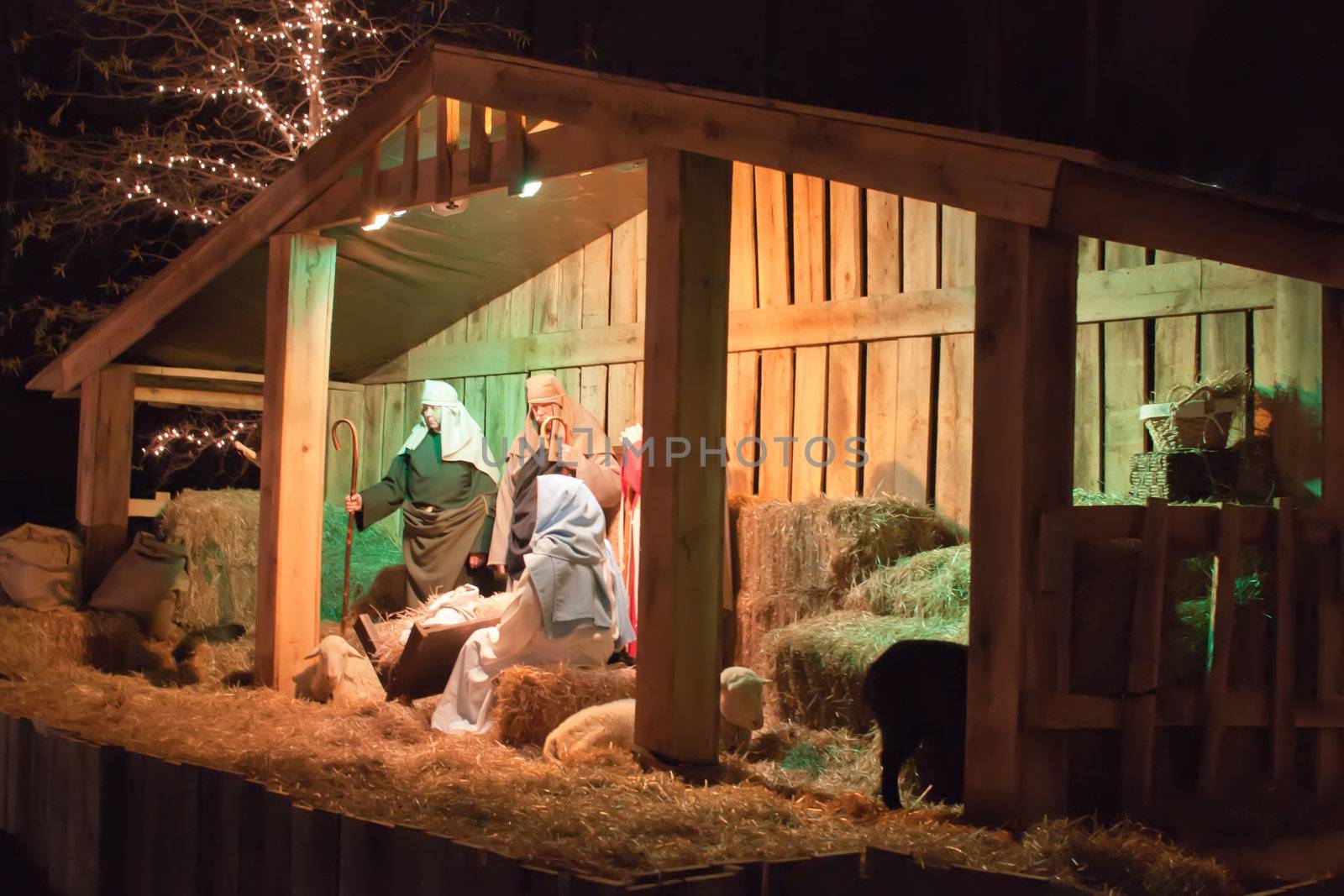 Live Christmas nativity scene reenacted in a medieval barn