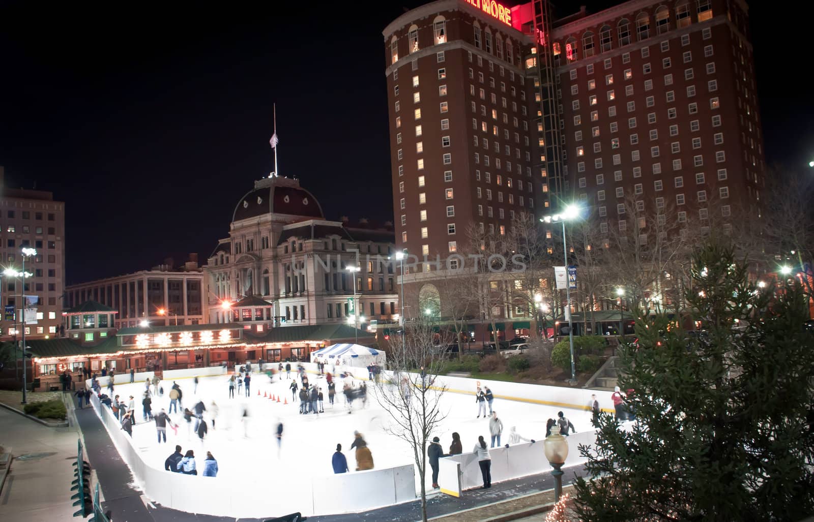 providence on a cold december evening with people ice skating