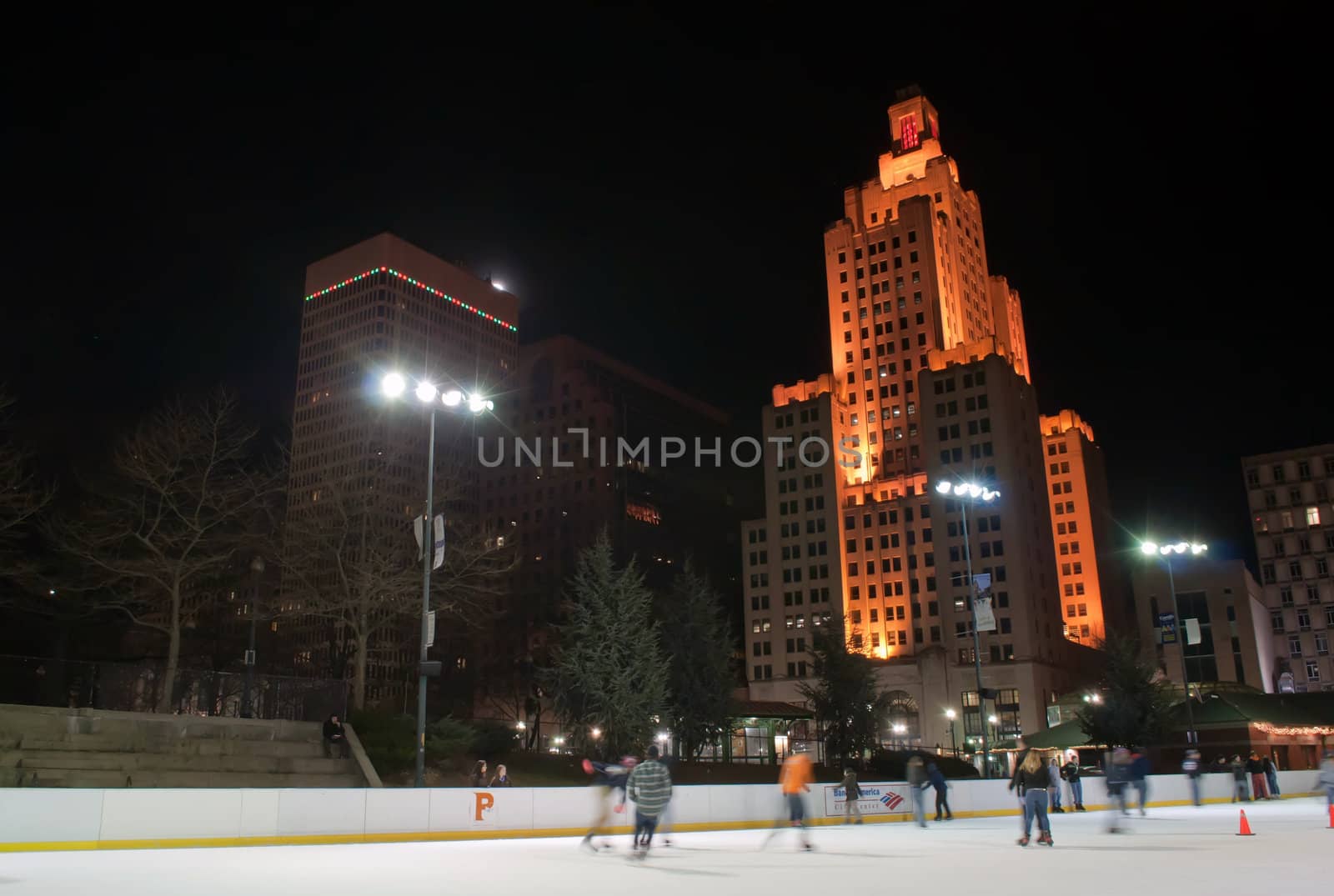 providence on a cold december evening with people ice skating