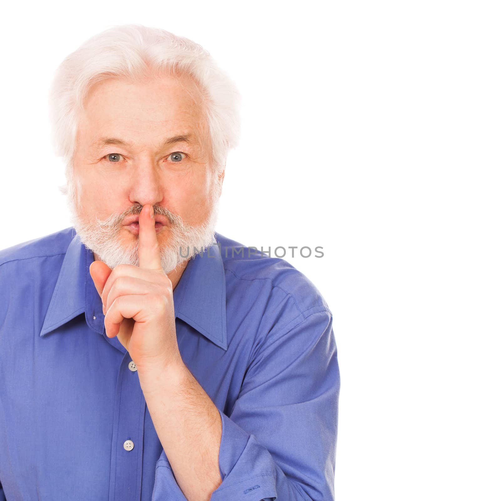 Handsome elderly man asks to silence with finger on lips isolated over white background
