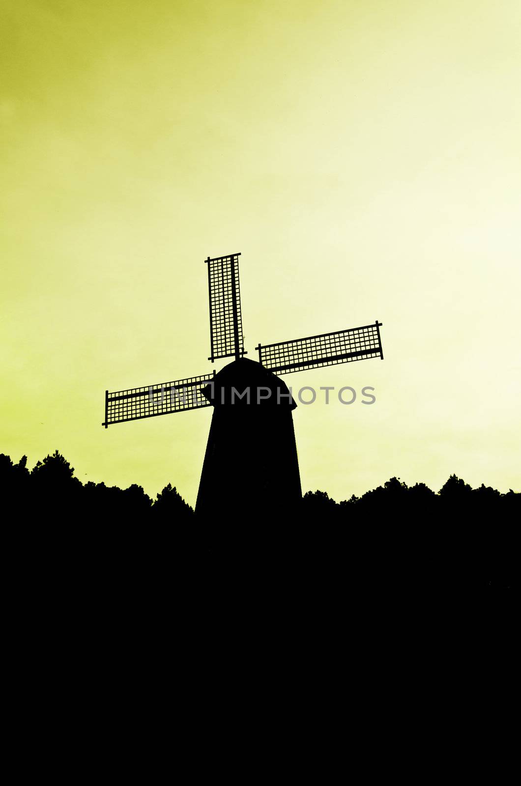 silhouette Wind generator on colorful sky