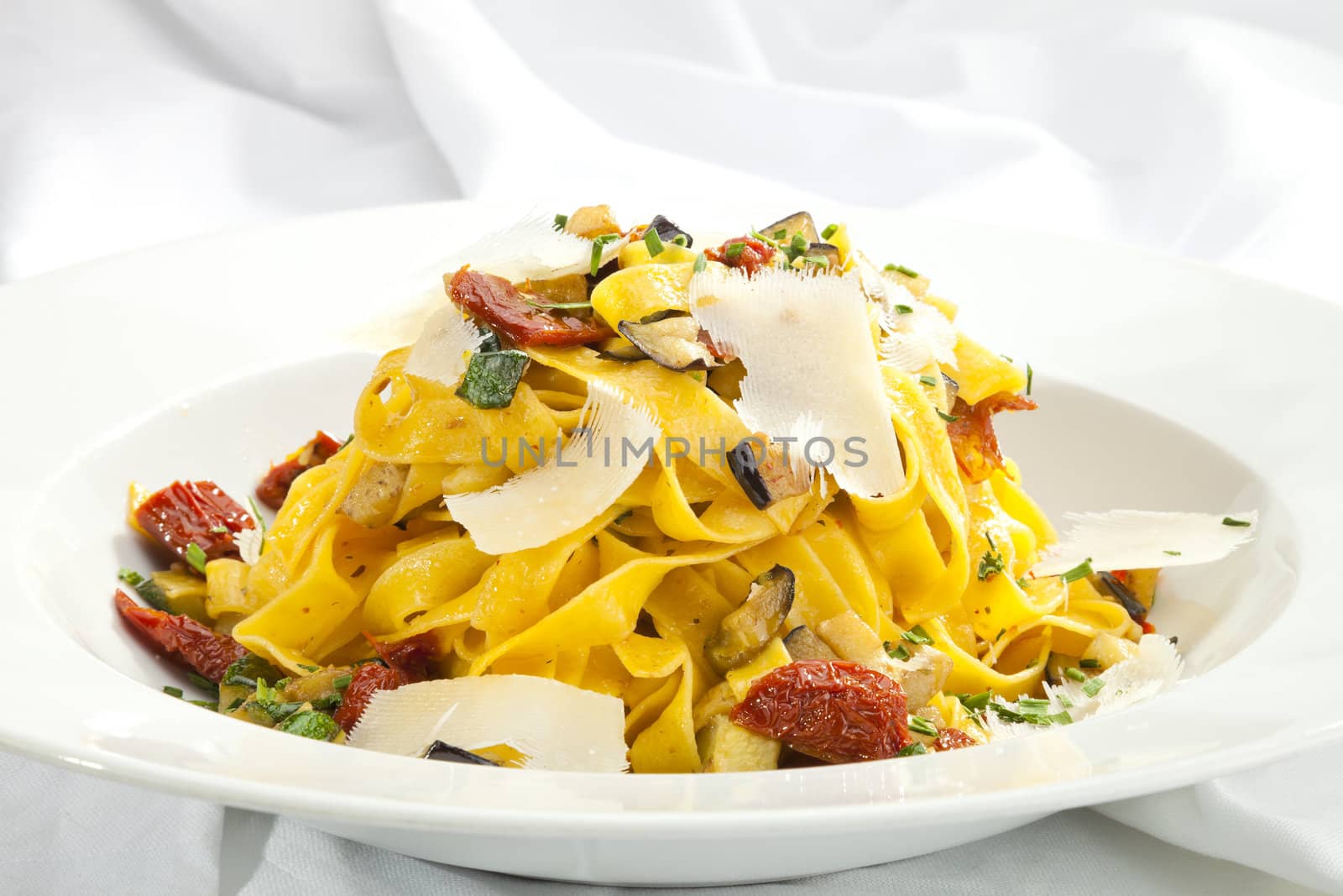 Fettuccine with dried tomatoes, parmesan and eggplant
