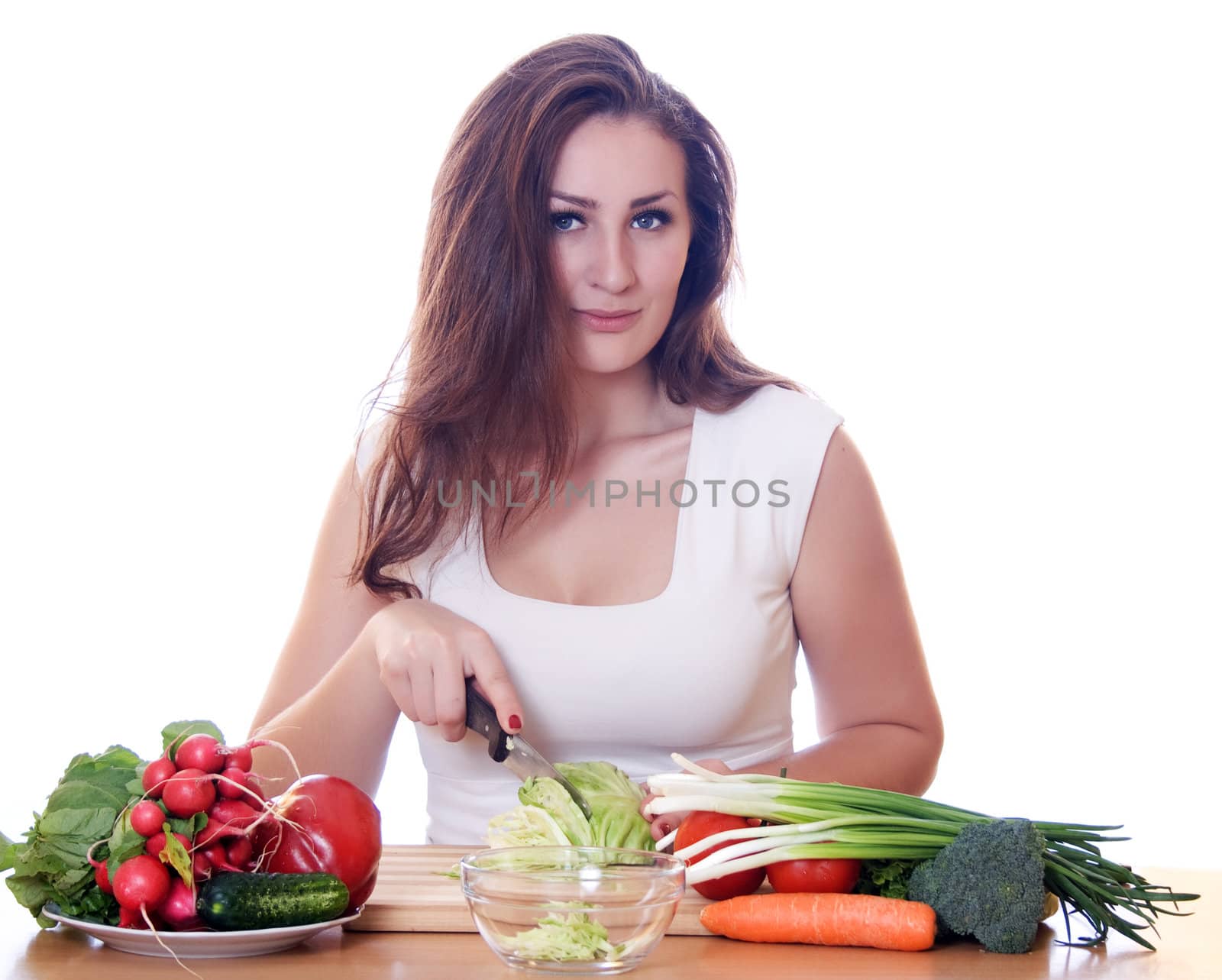 Smiling woman cooking healthy food isolated