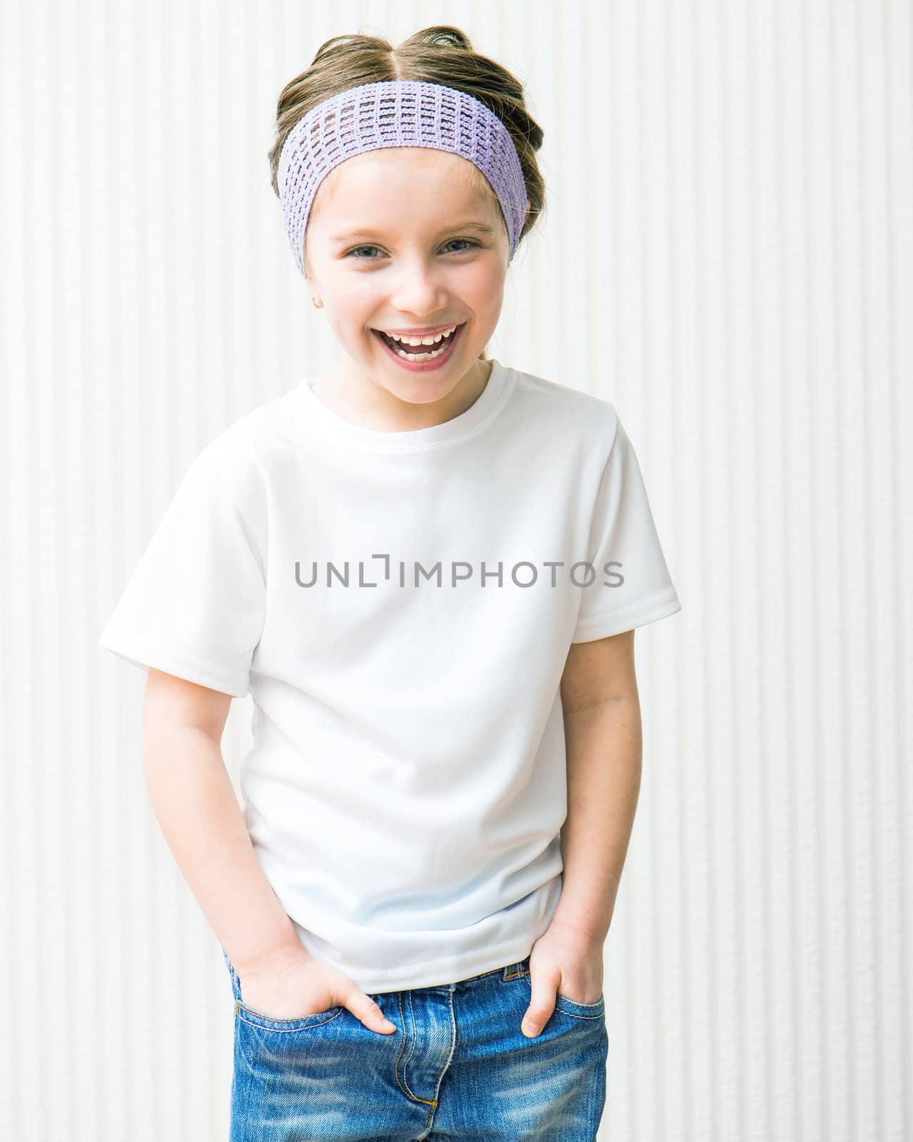 smiling little girl in white t-shirt