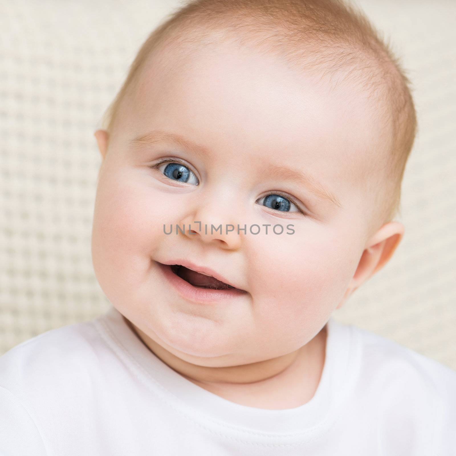closeup portrait of smiling adorable baby