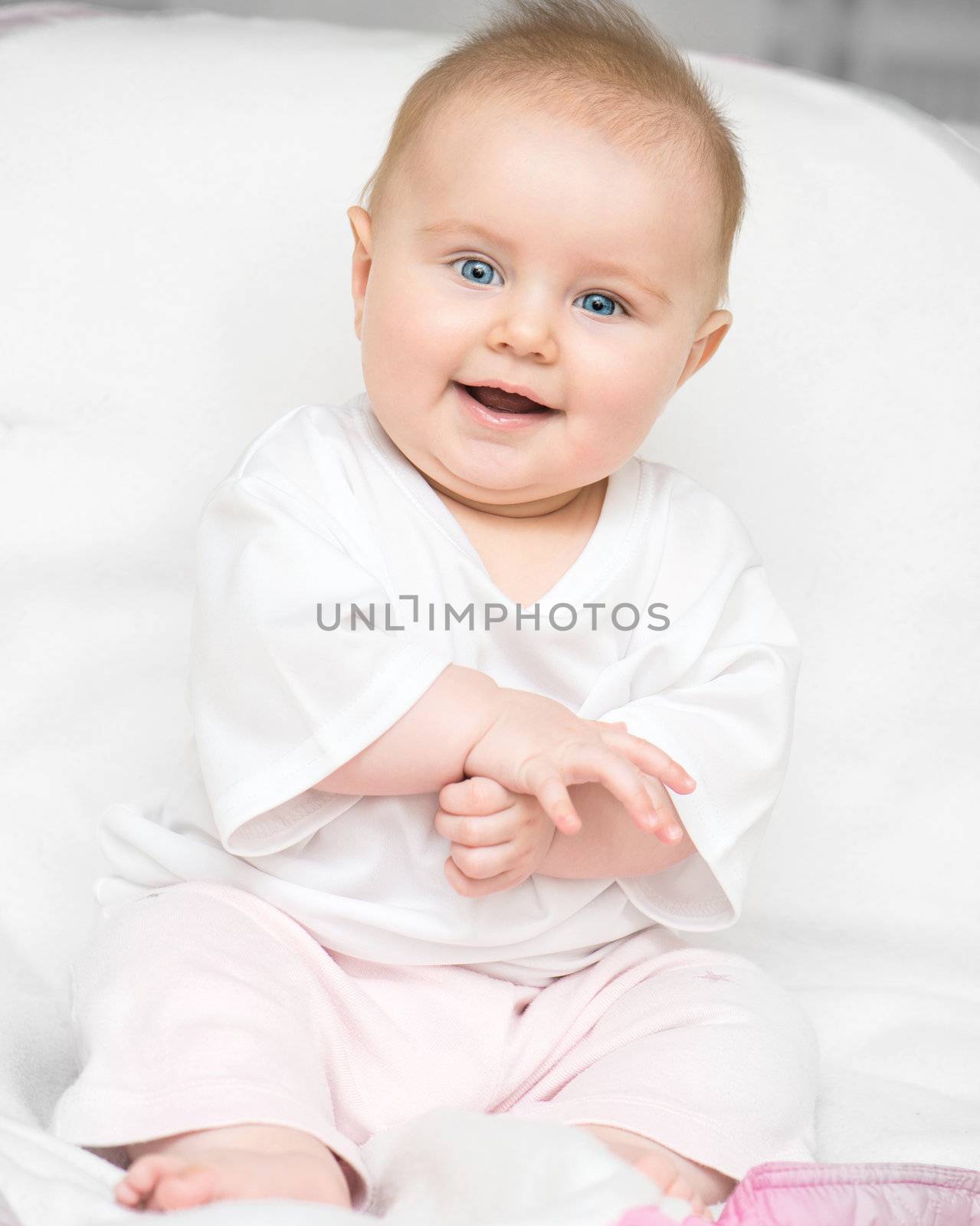 smiling adorable baby looking into camera
