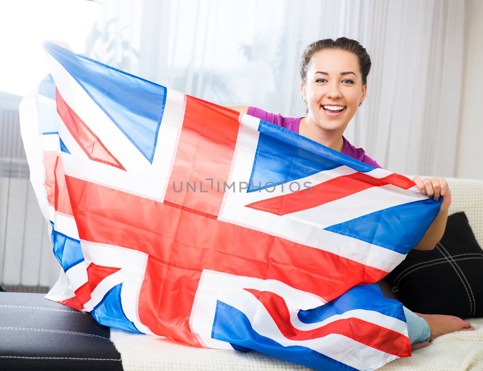 British woman holding the Jack Union flag
