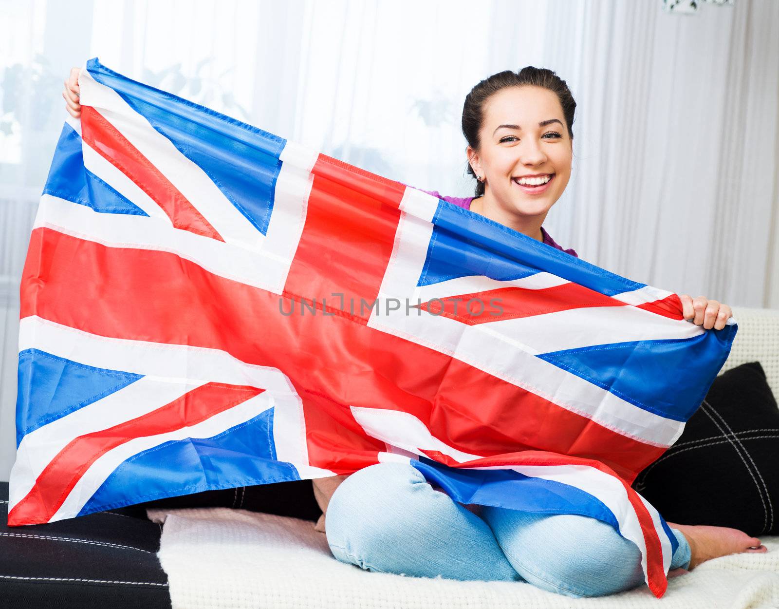 British girl holding the Jack Union flag