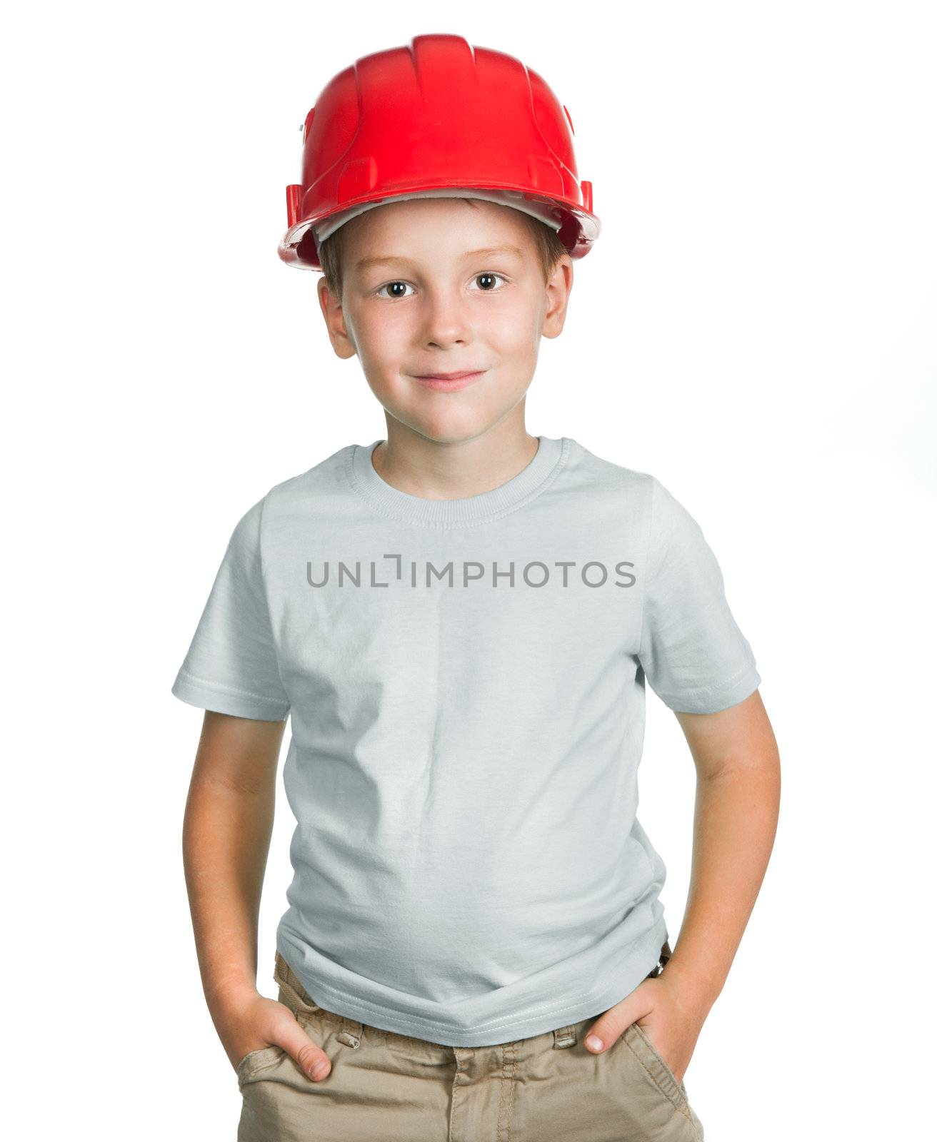 Portrait of little boy with hard hat on white background