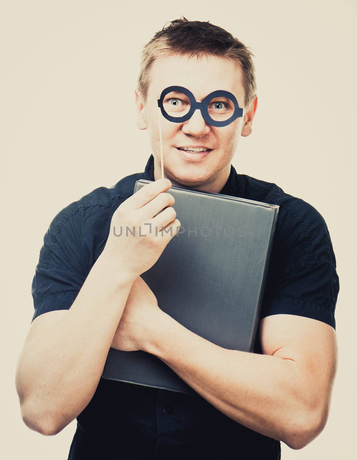 amusing man with fake glasses and book
