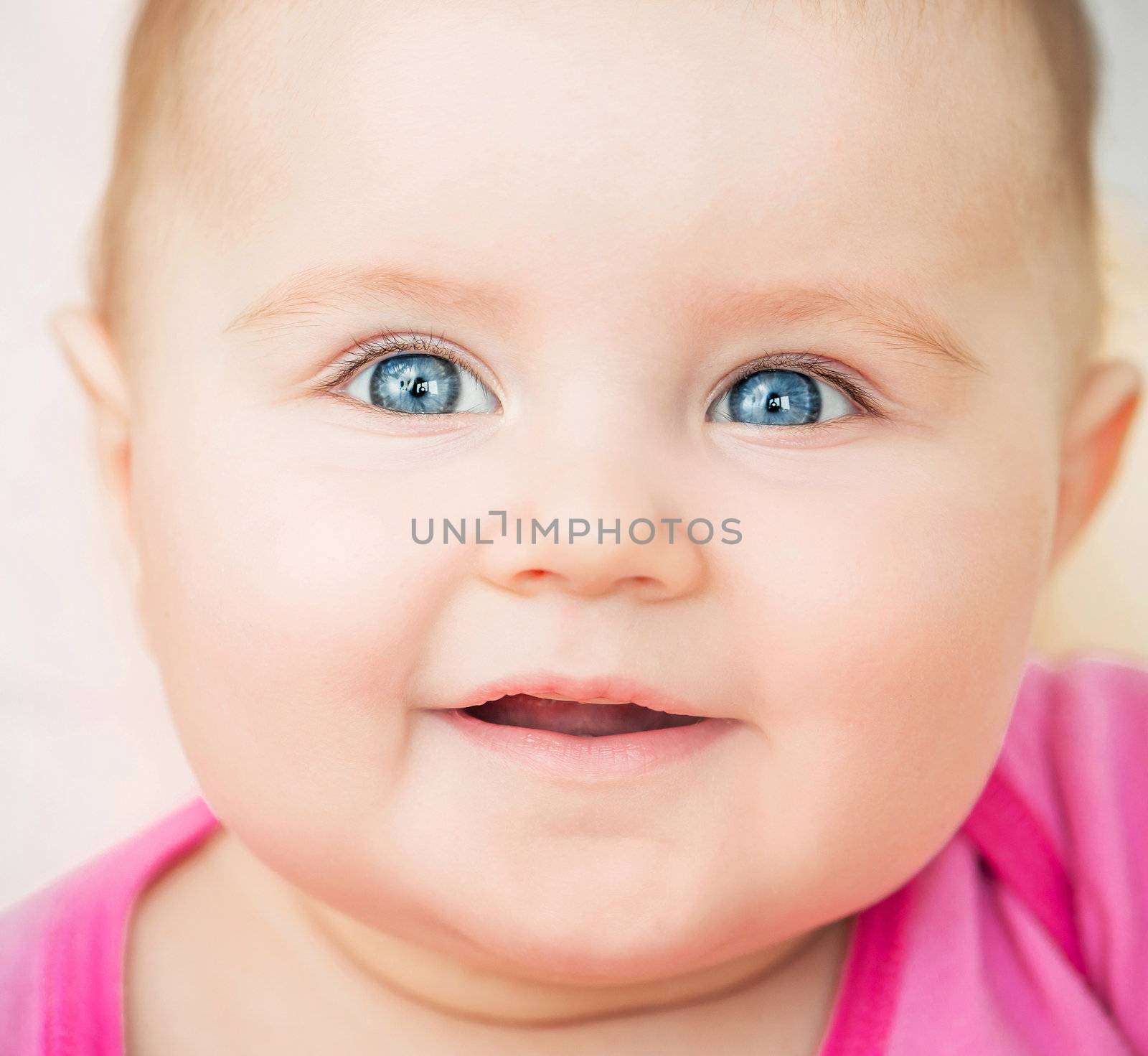 bright closeup portrait of adorable baby