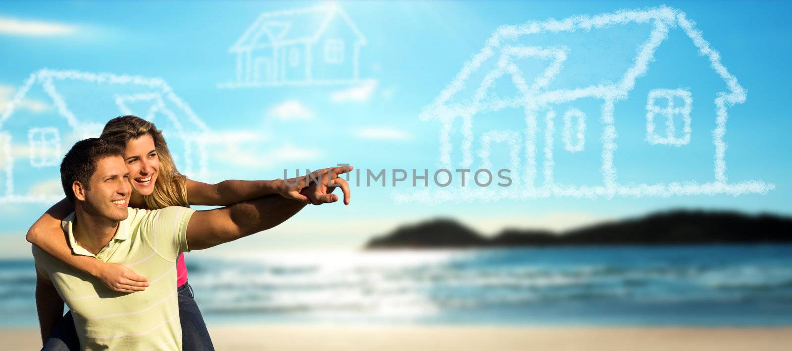 Happy couple on the beach dreaming of a house. by rawstylepictures