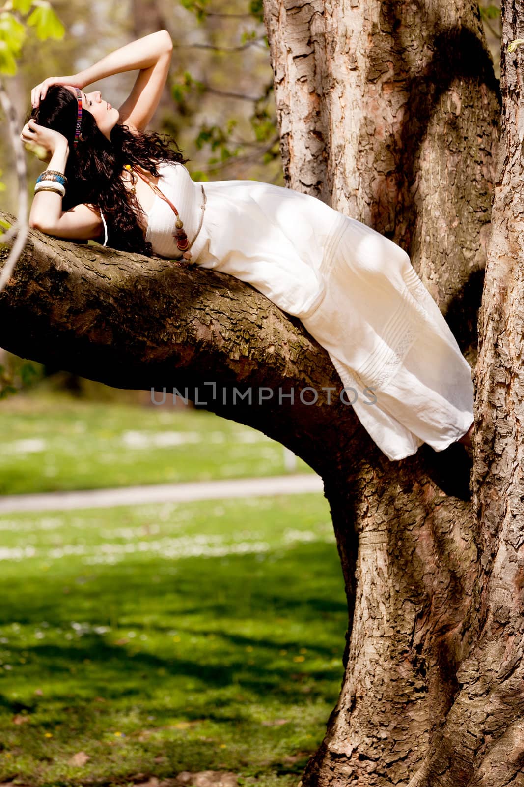 beautiful brunette woman relax outdoor in summertime 
