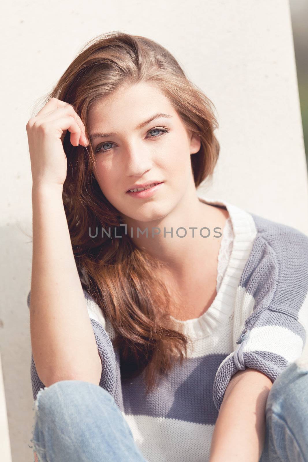 attractive young brunette woman barefoot in summertime outdoor