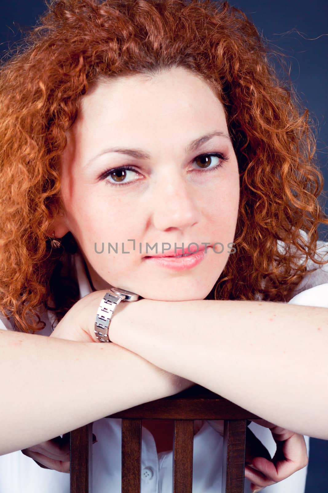 attractive young redhead woman emotion portrait ob black 