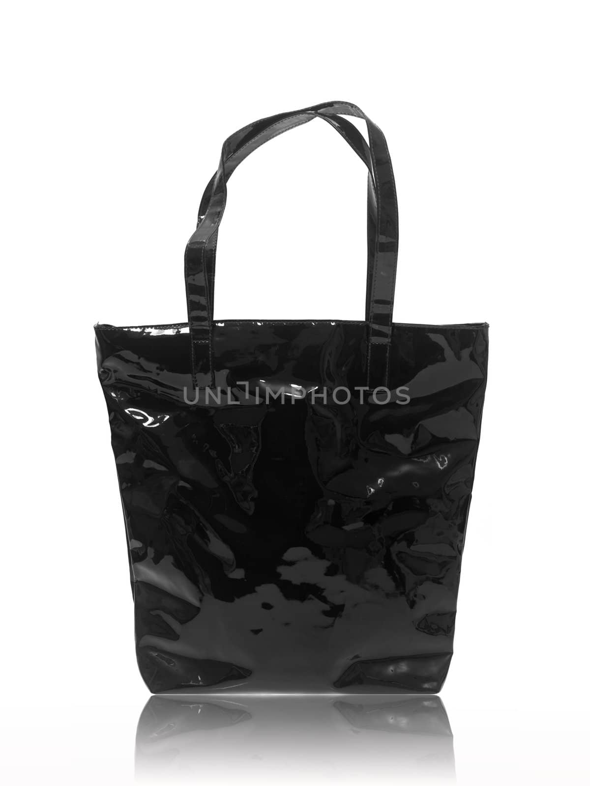 A ladies bag isolated against a white background