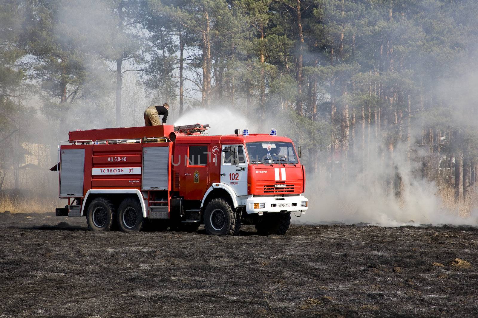  the fire crew extinguishes a burning grass in the settlement  Thresholds on May 04, 2013