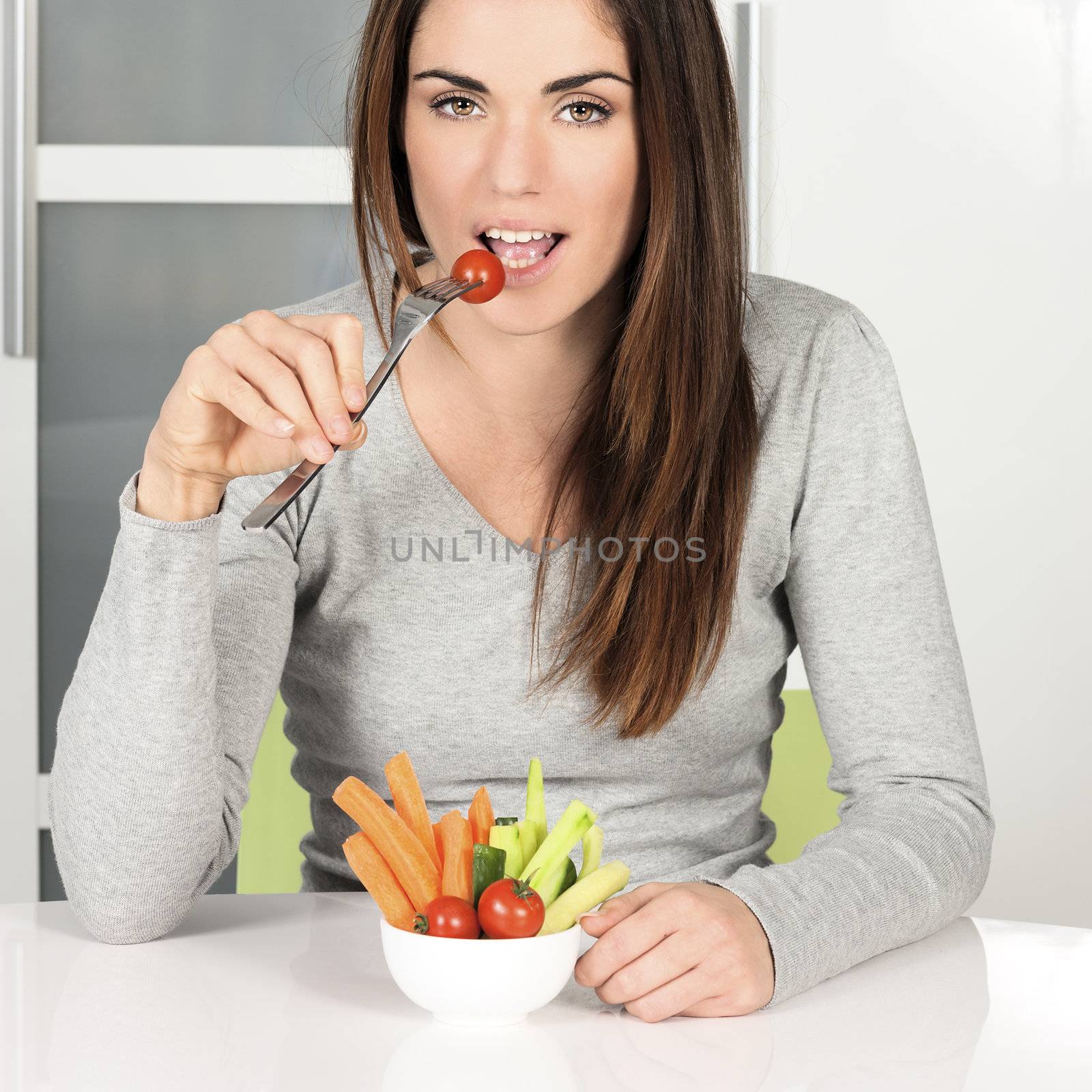 girl eating vegetables food at home