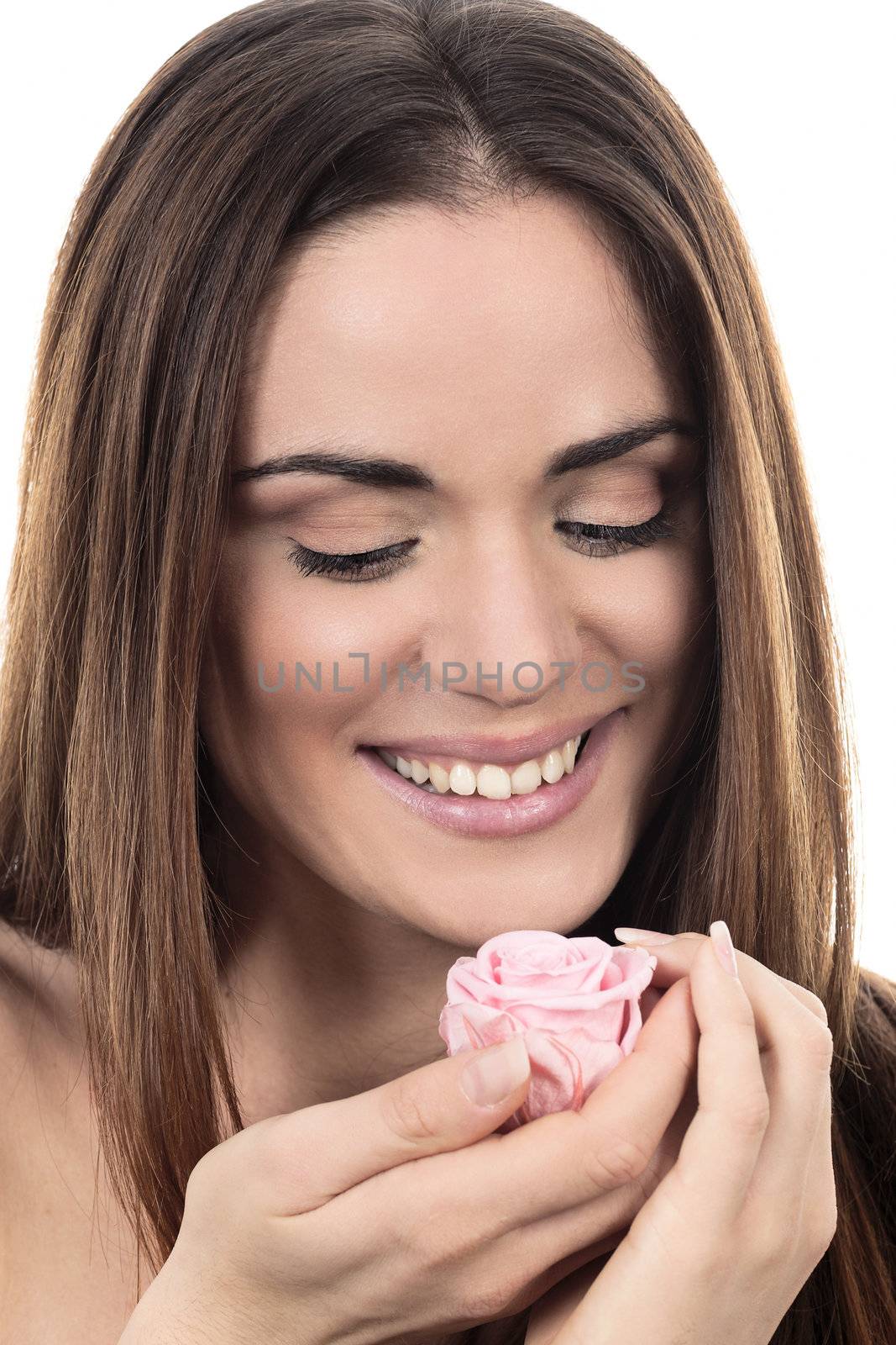 Cute woman with pink rose on white background