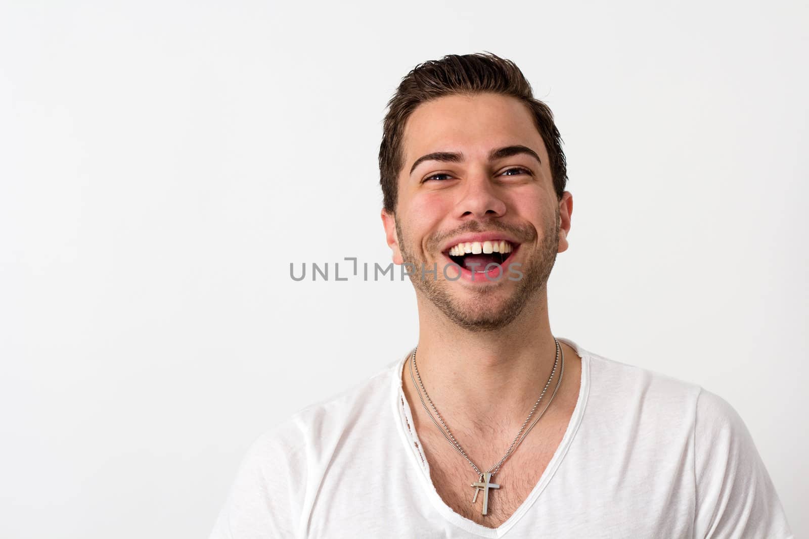 Portrait of a Young Attractive brunette Likeable Man