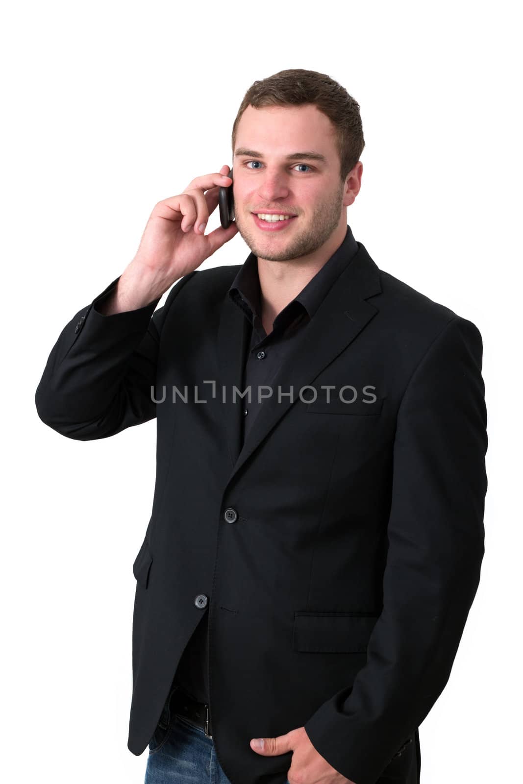 Young Man in jacket talking on the phone by dwaschnig_photo
