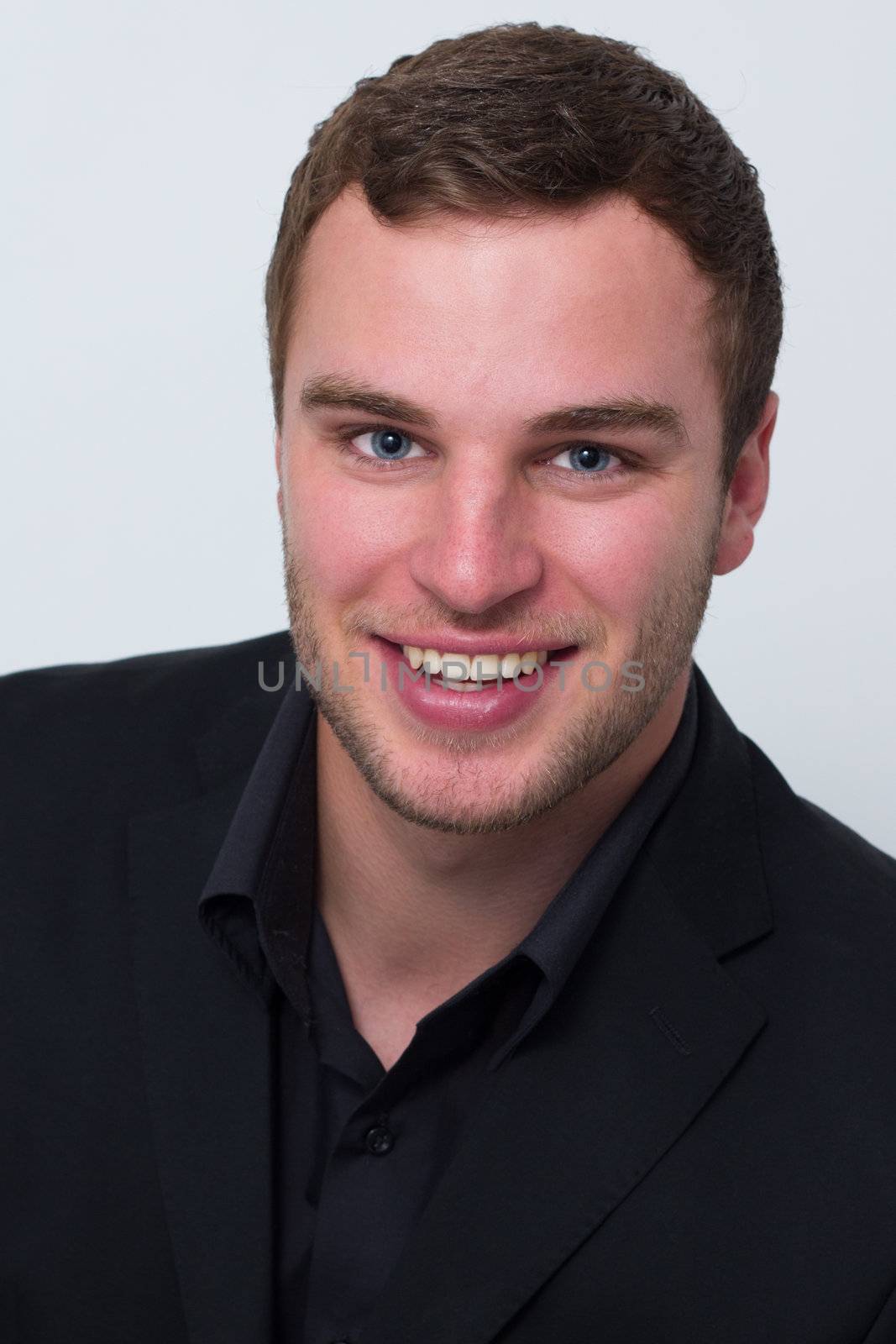 application photo of a young man who is smiling