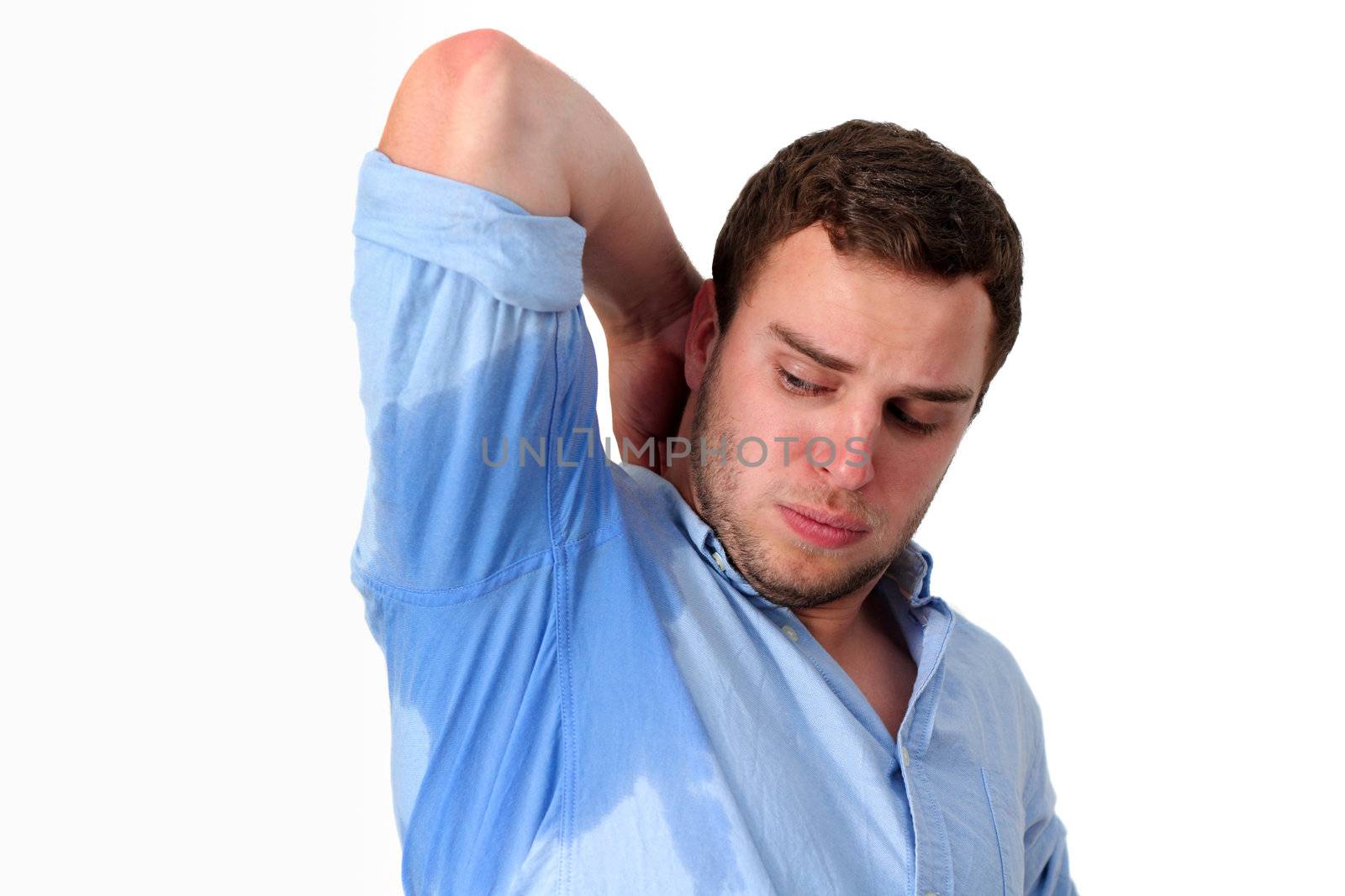 Man with Hyperhidrosis sweating very badly under armpit