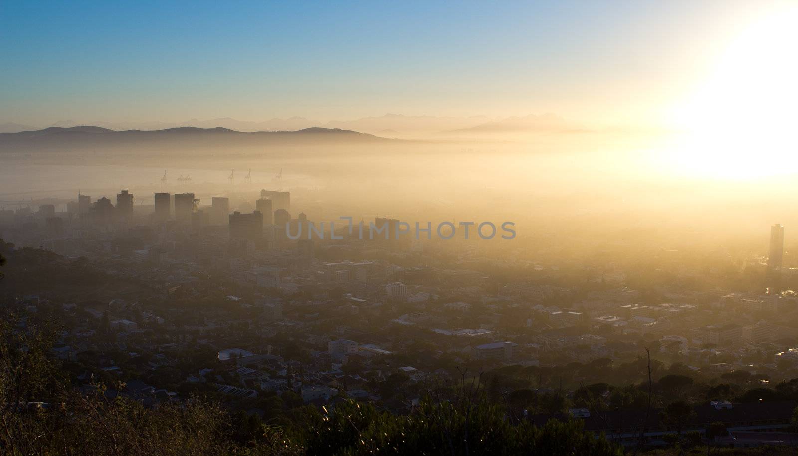 Photo Of Cape Town On A Misty Morning With Buildings Looking Through The Fog