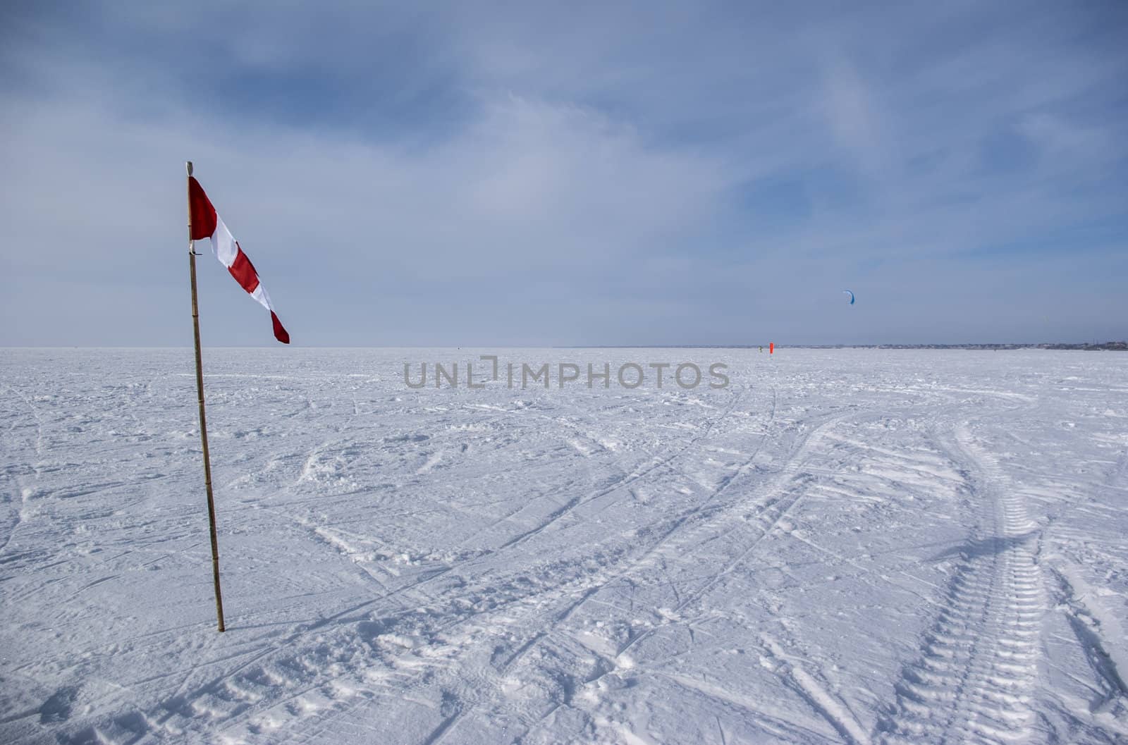 flag in the snow in an open space