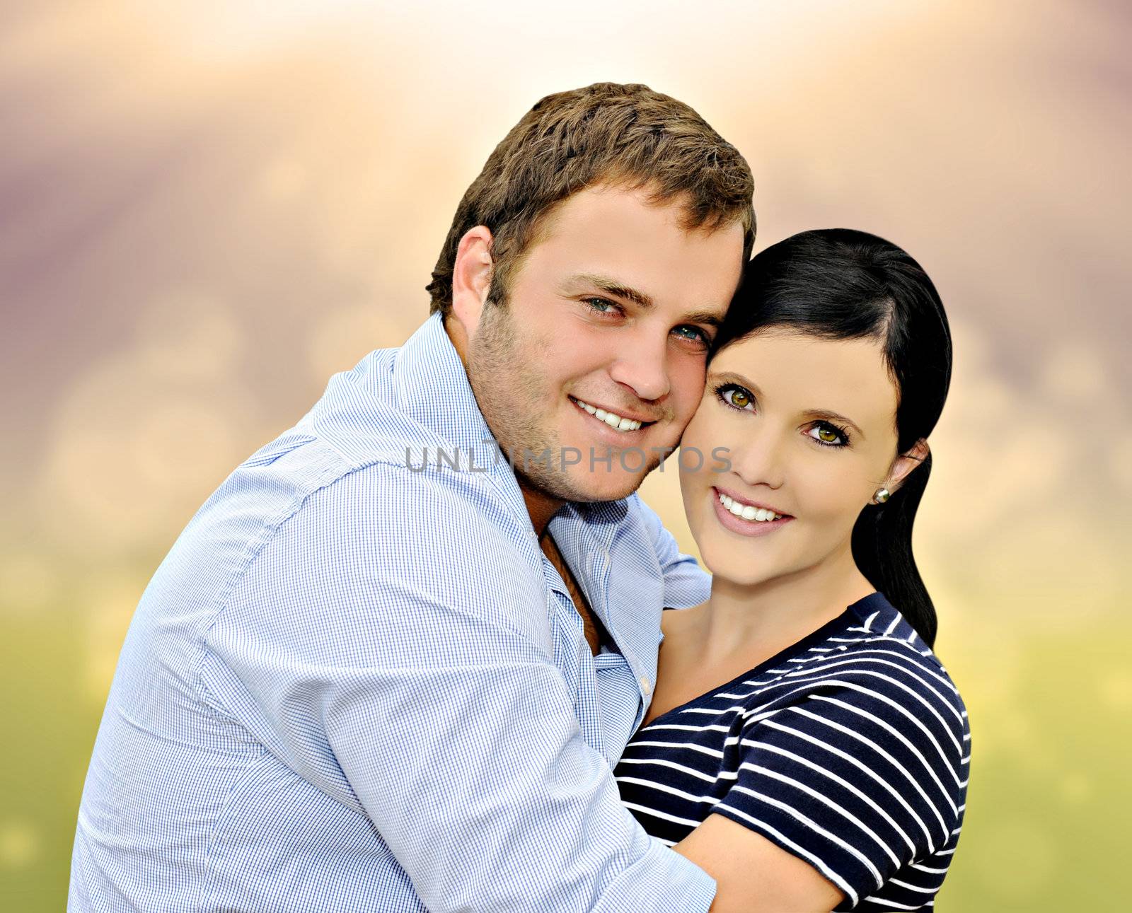 Beautiful happy  young couple with spring background by tish1