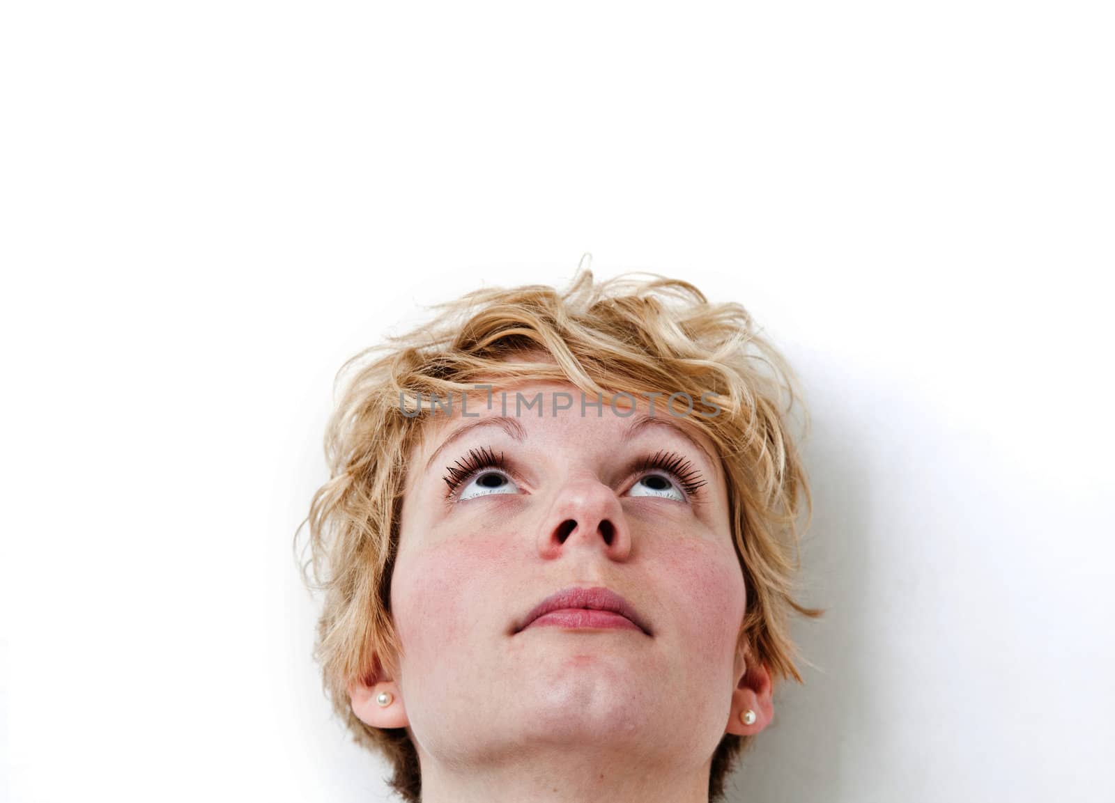 Young blond girl with morning look and mixed hairs on a white background