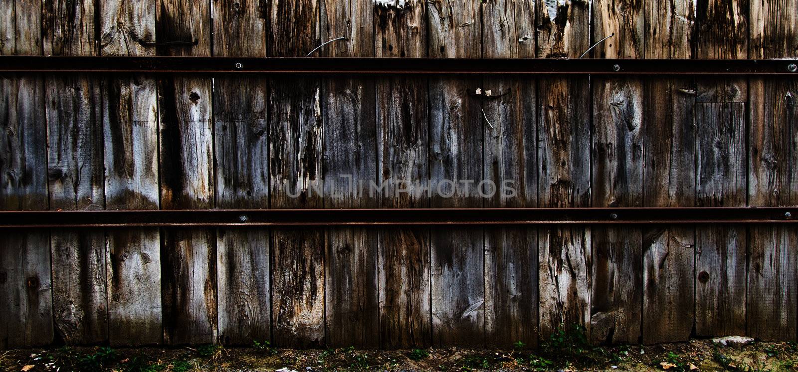 This is an old wood fence in old Montreal with rusty metal. Very contrasty texture with a lot of details.