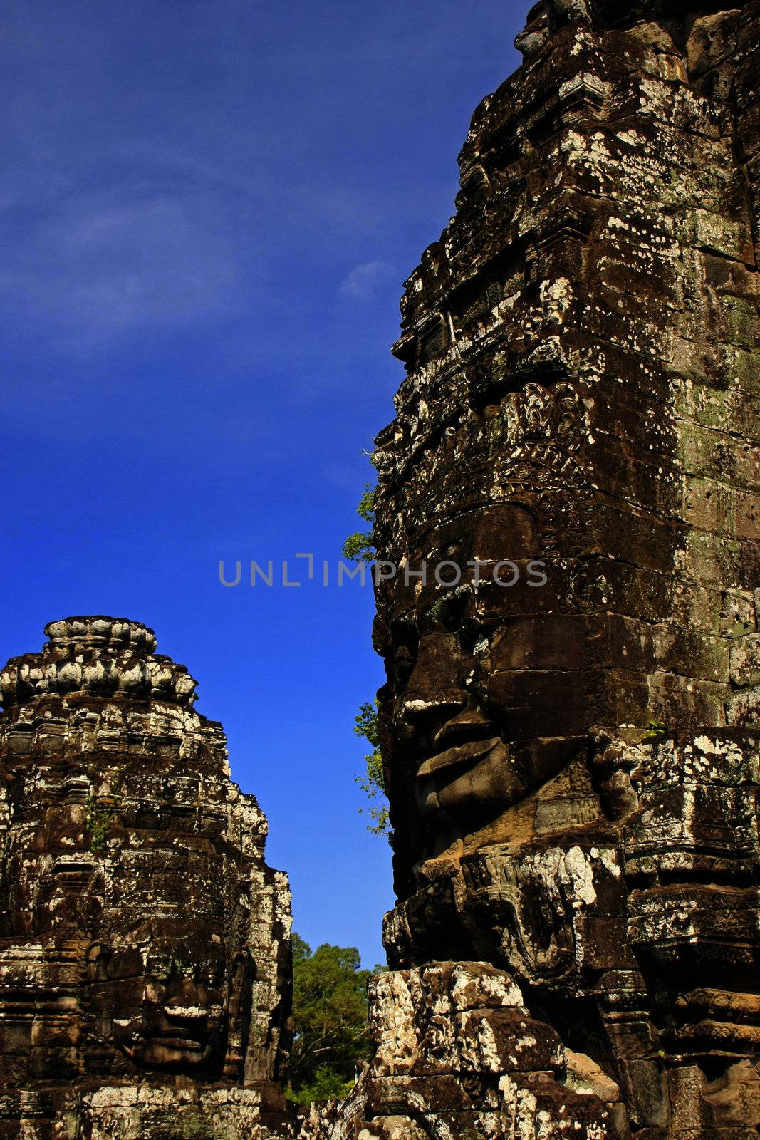 Stone faces of Bayon temple, Angkor area, Siem Reap, Cambodia