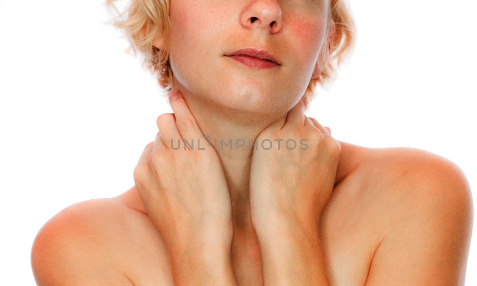 Crop image of calm girl holding her neck - isolated on white background