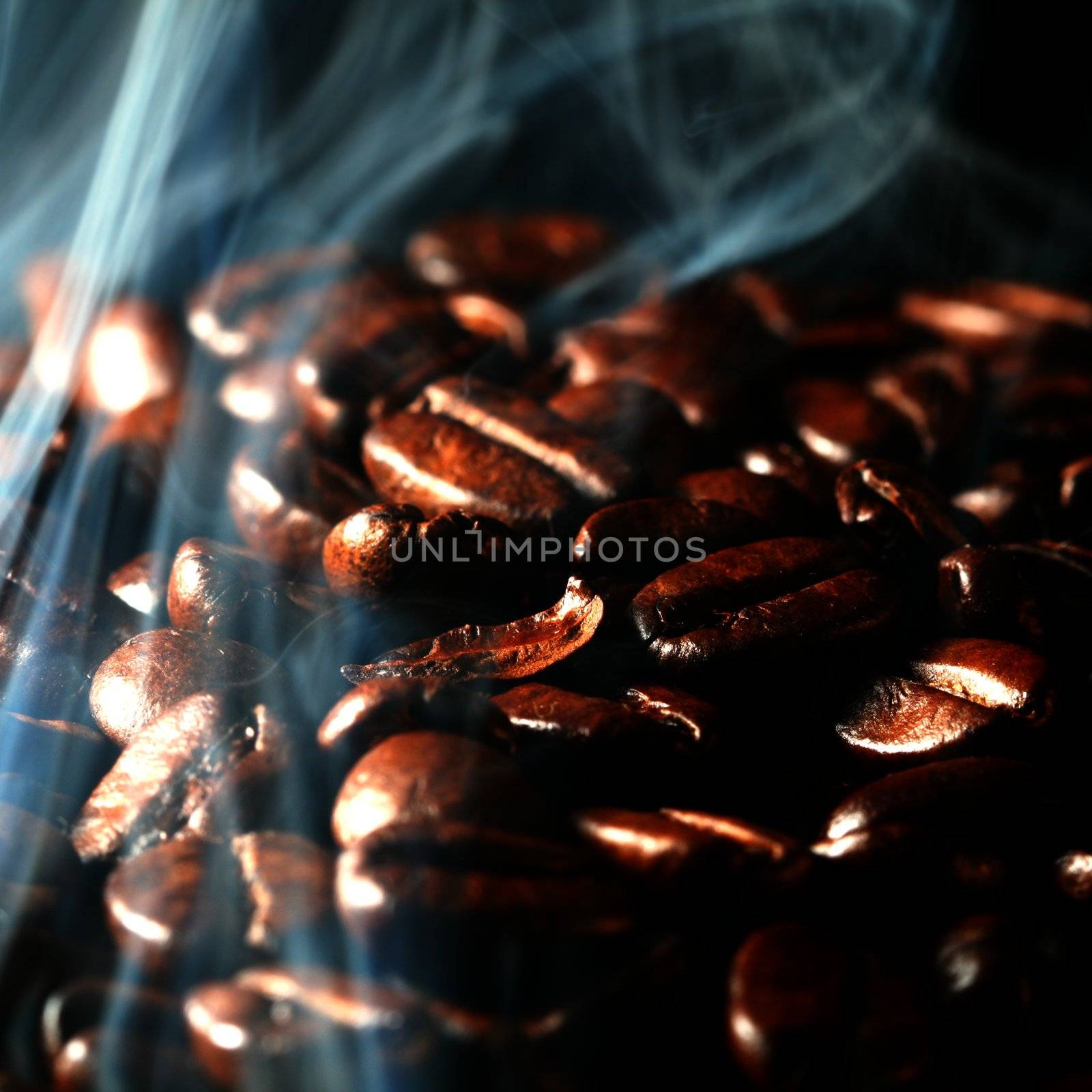macro coffee beans in aroma smoke
