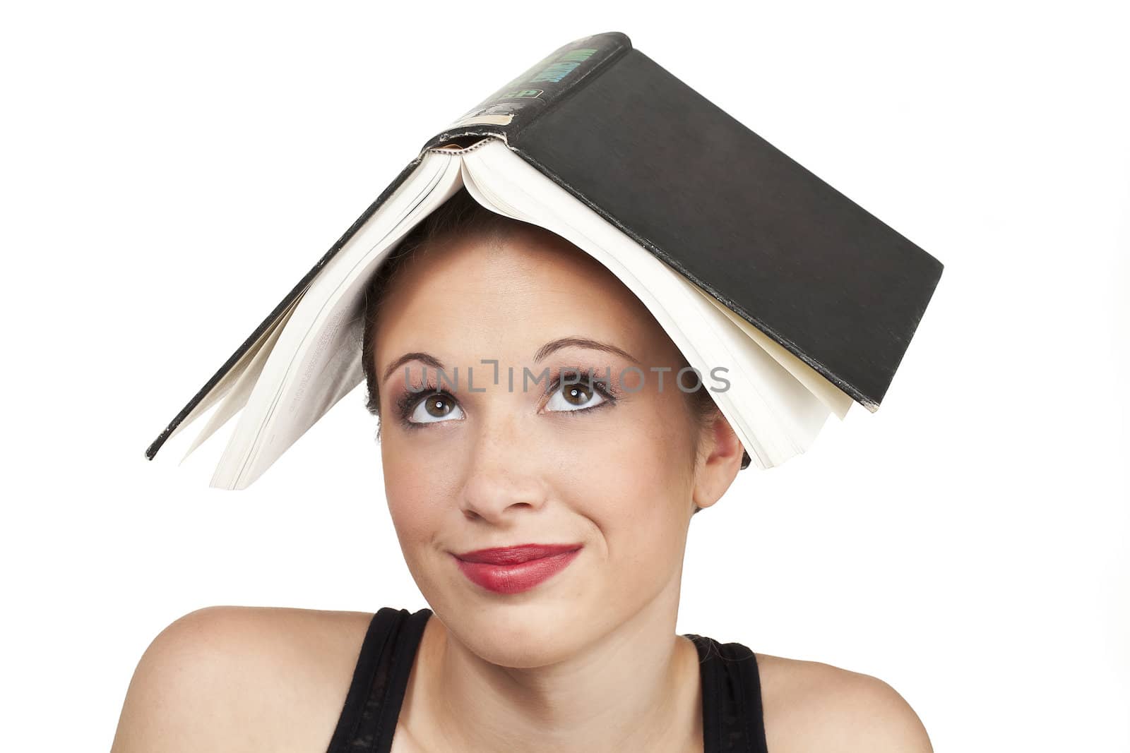confused expression head shot with book on head by kozzi