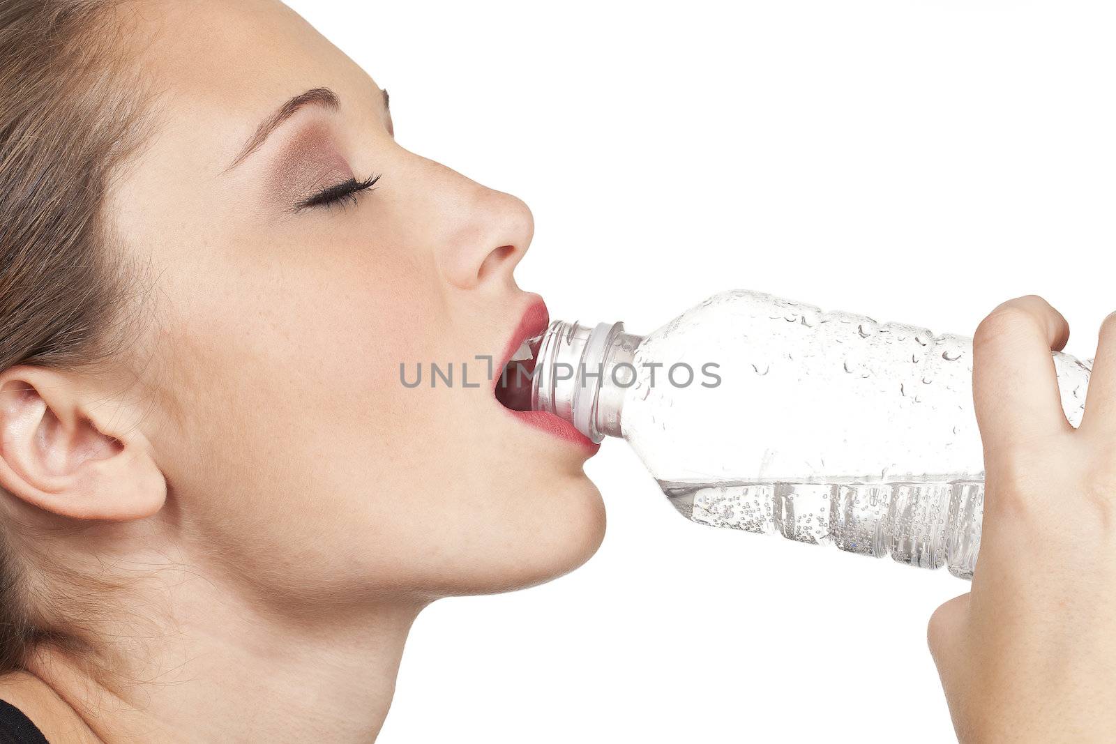 teen model closup of drinking water out of clear water bottle by kozzi