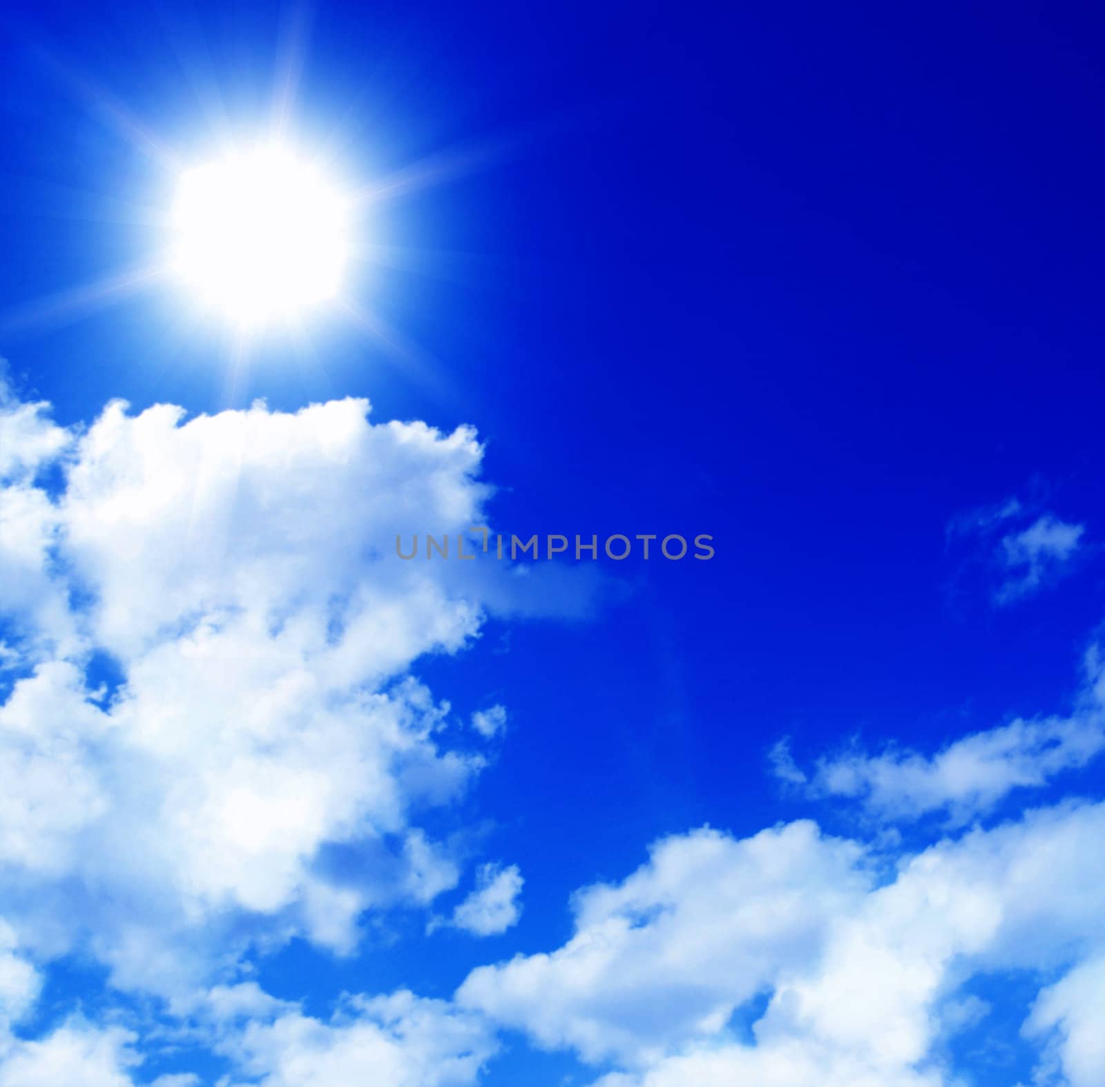 Blue sky with clouds and sun  