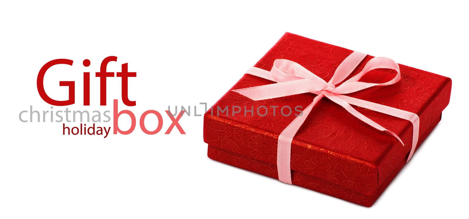 Single red gift box with pink ribbon on white background.