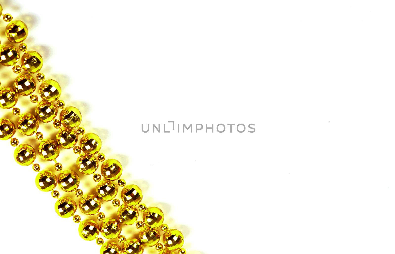 Background made of a brilliant celebratory beads of golden color