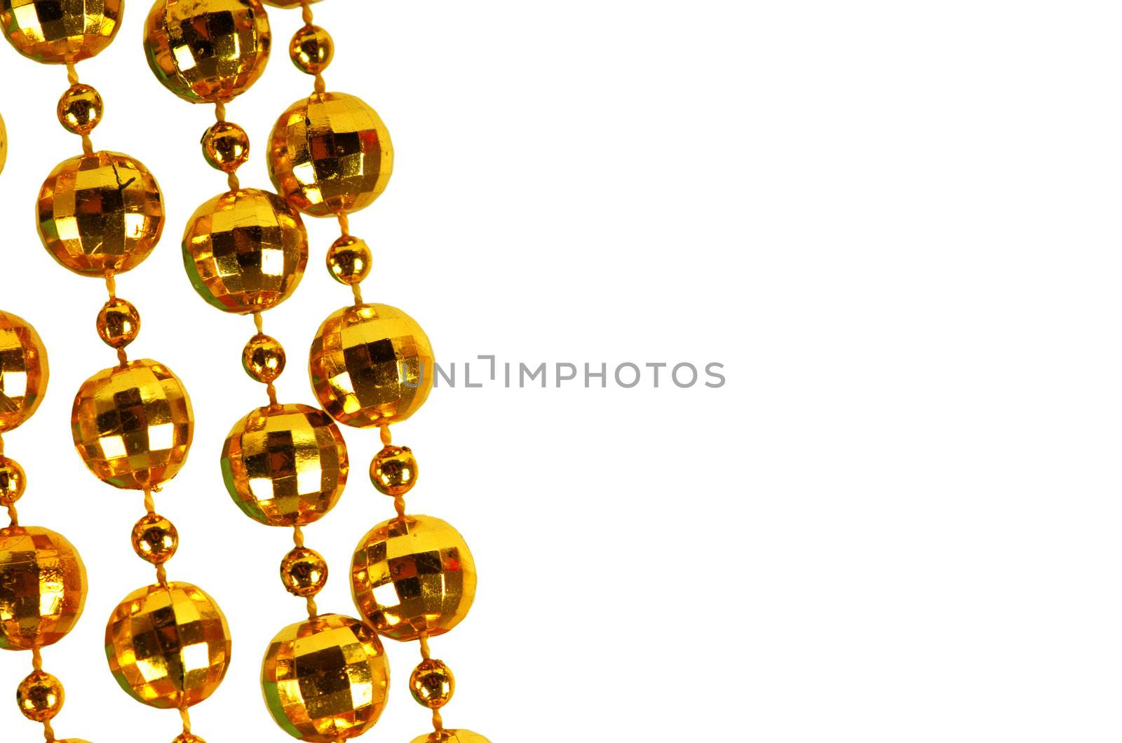 Background made of a brilliant celebratory beads of golden color