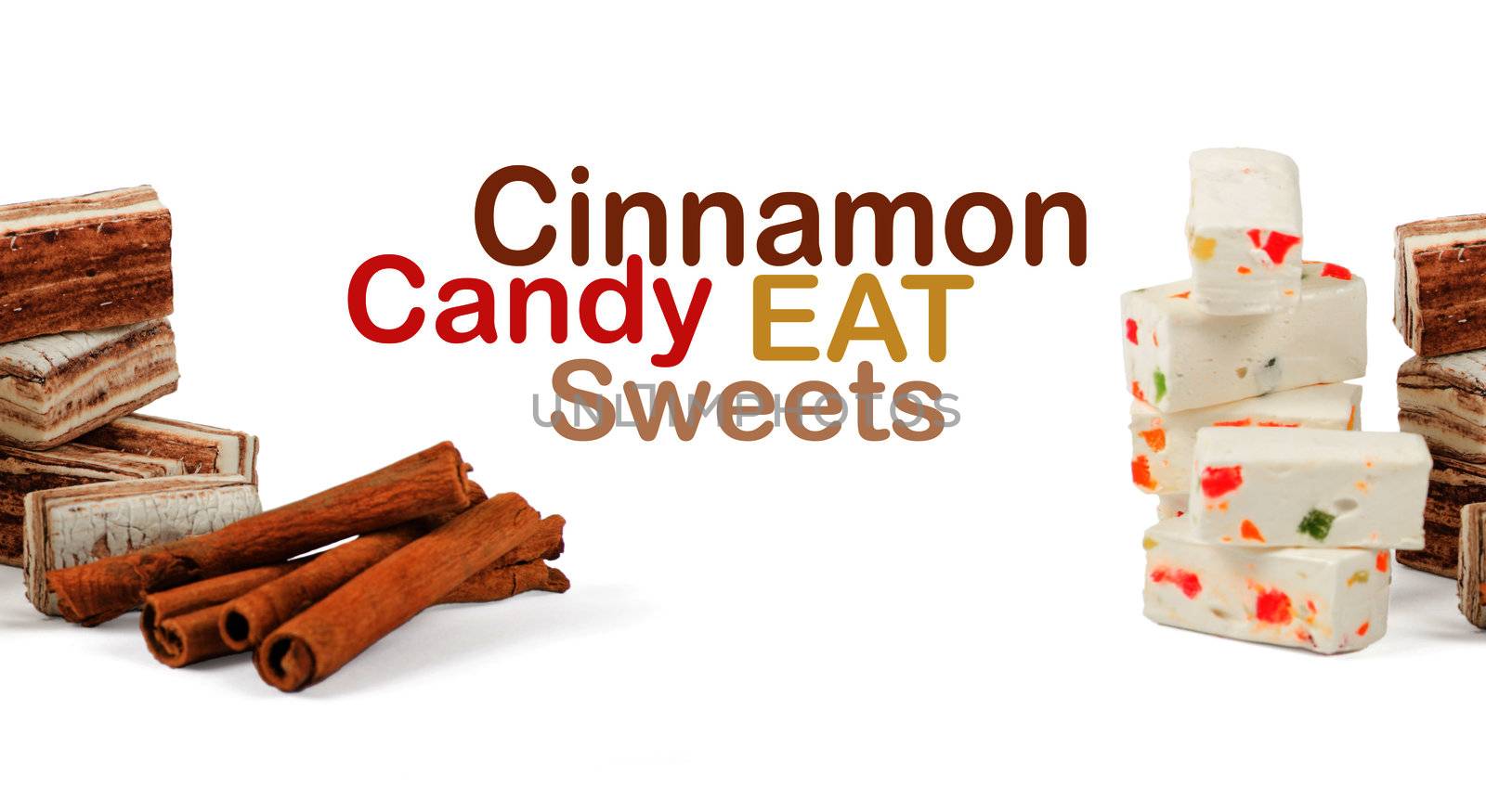 Sweets and cinnamon sticks isolated on white background