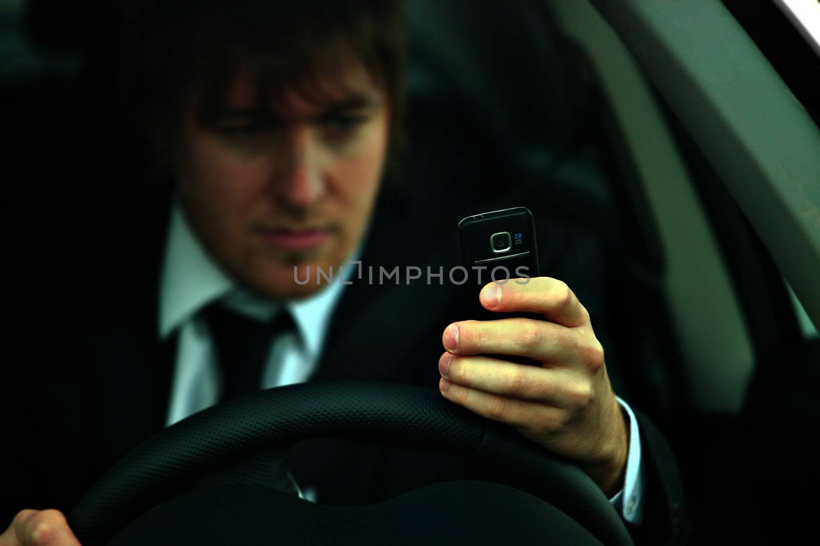 Man texting and driving