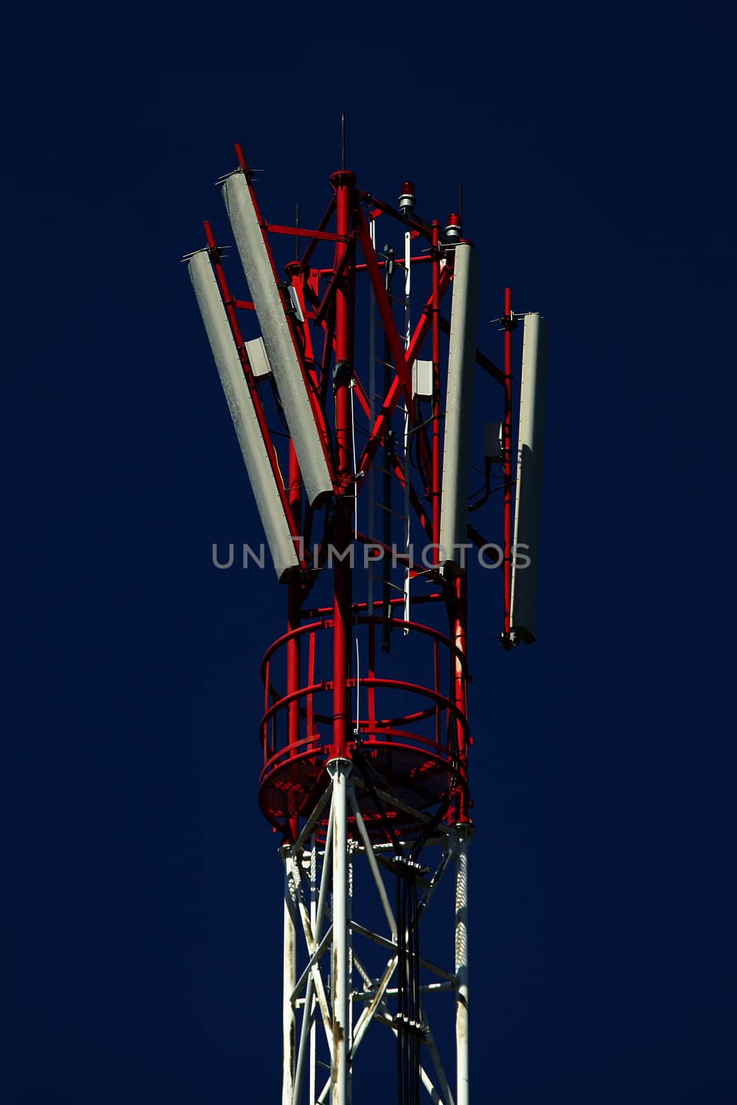 Transmitter tower against clear blue sky