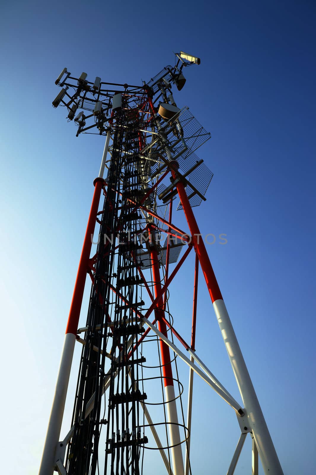 GSM transmitter tower against blue sky