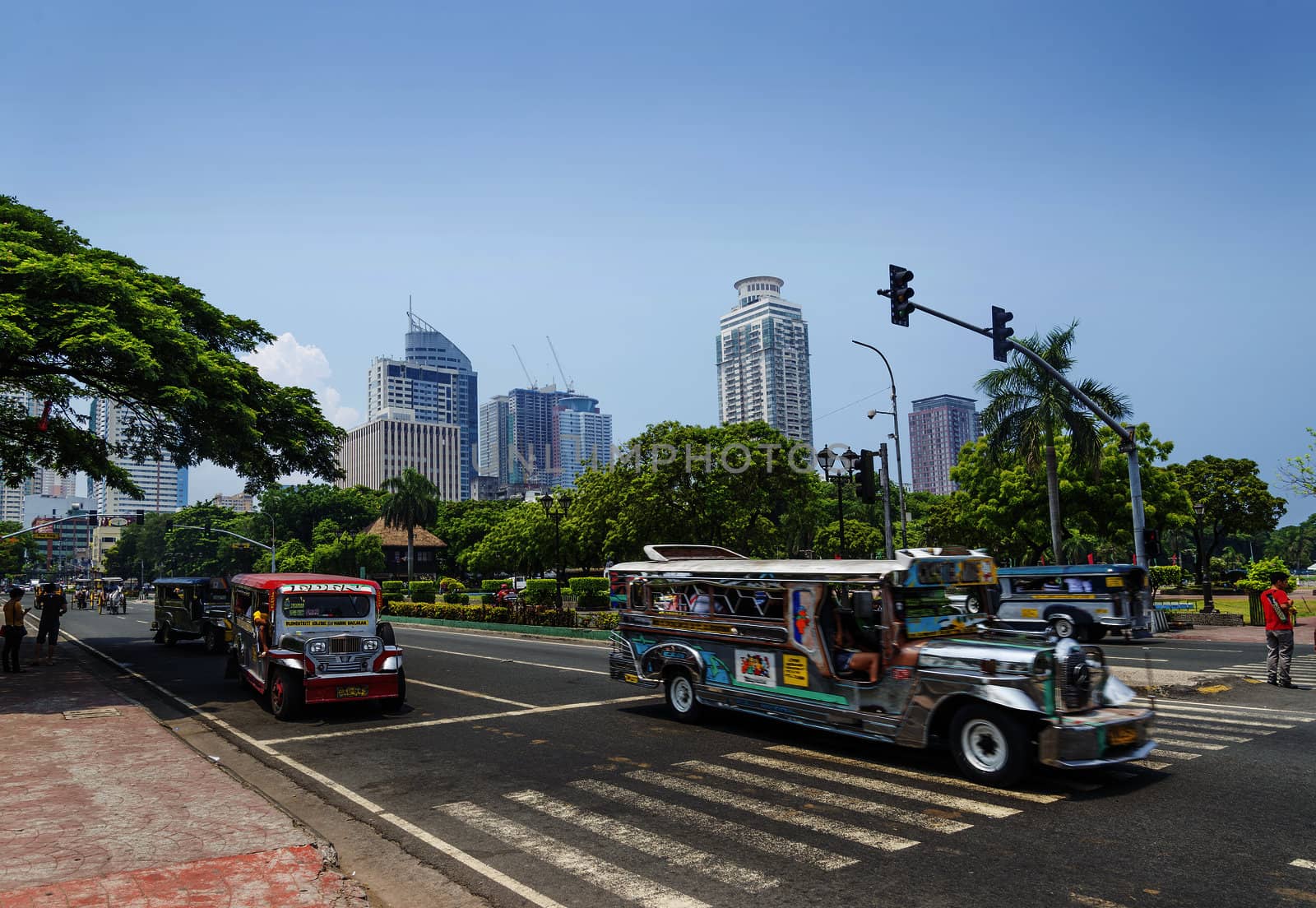 jeepneys in rizal park manila philippines by jackmalipan